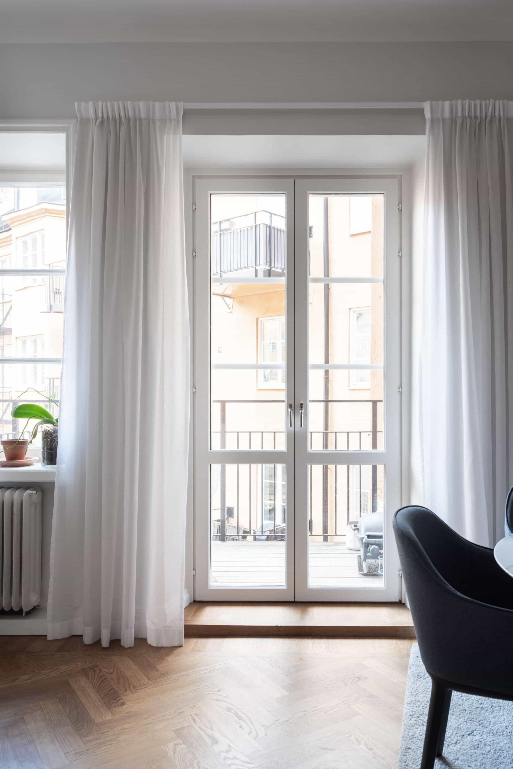 this is a scandinavian apartment with linen curtains