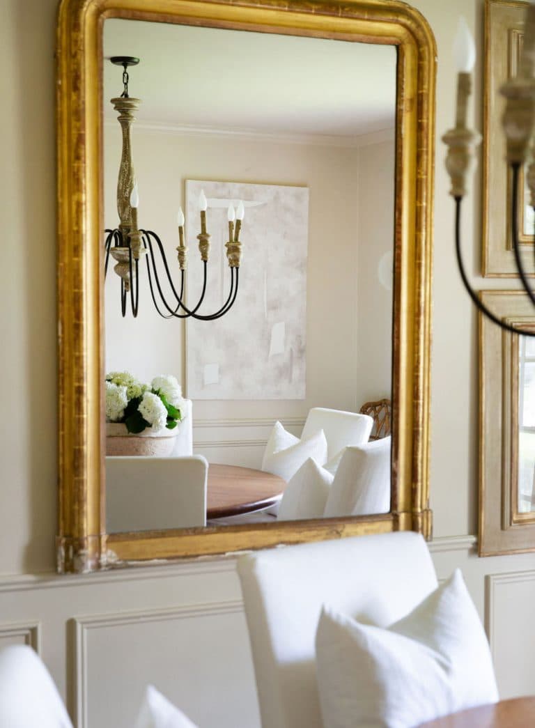 this is a mirror with a gold rim