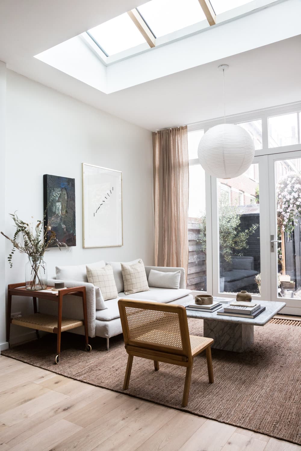 this is a japandi inspired living room with woven fabrics