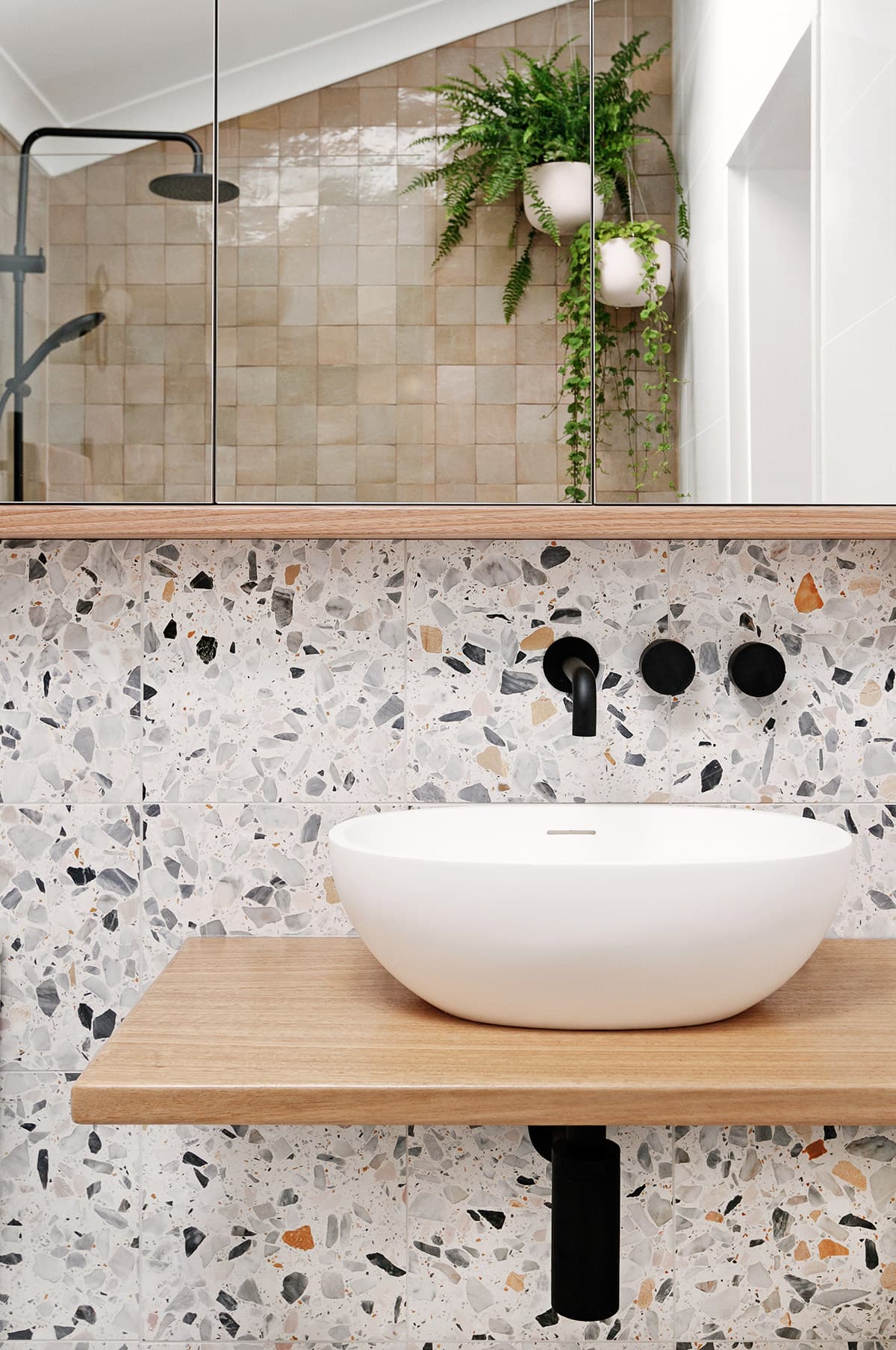 this is a bathroom with terrazzo tiles by we are scout