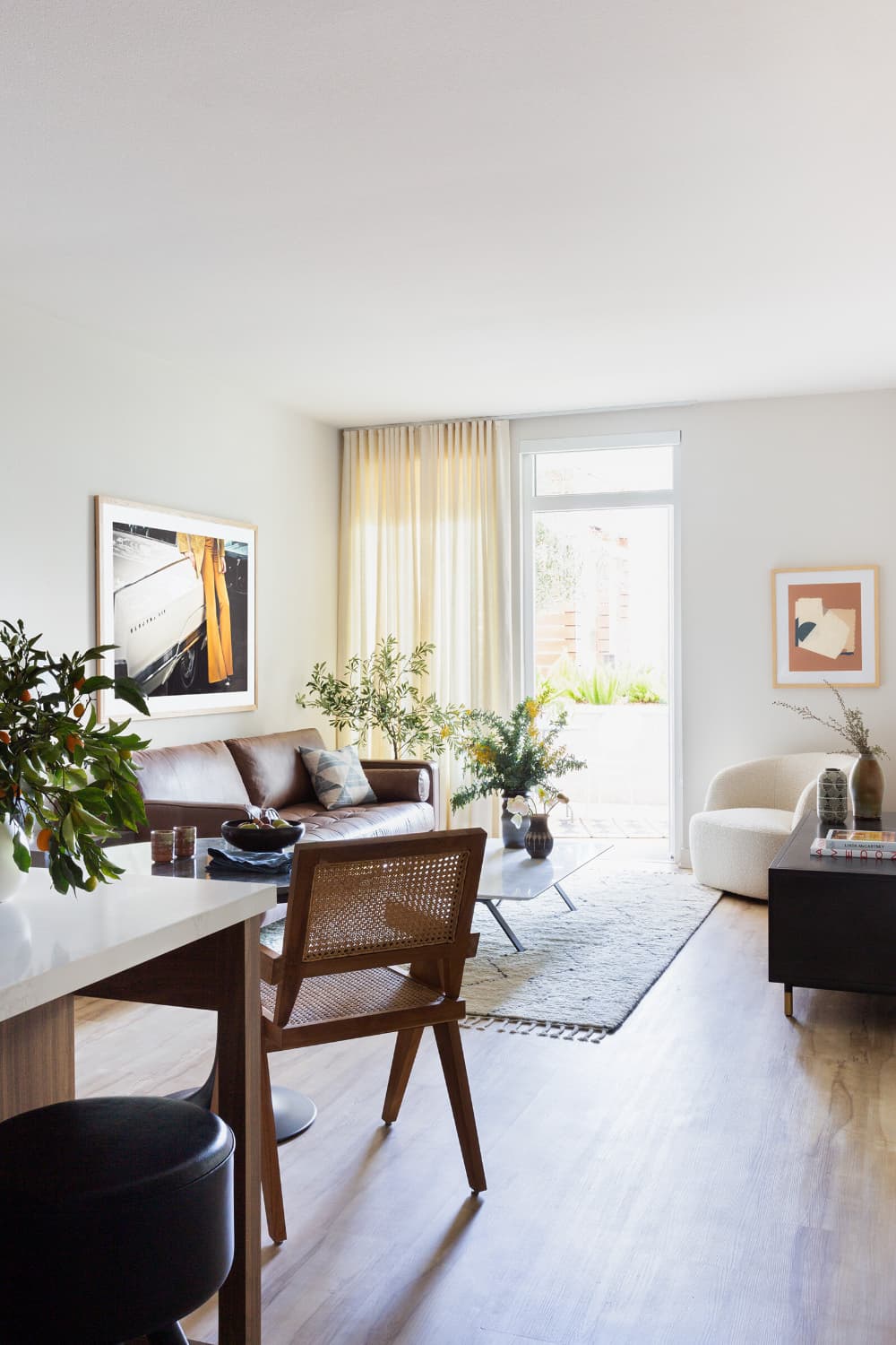 this is a serene living room with mid century and japandi elements designed by Stefani Stein