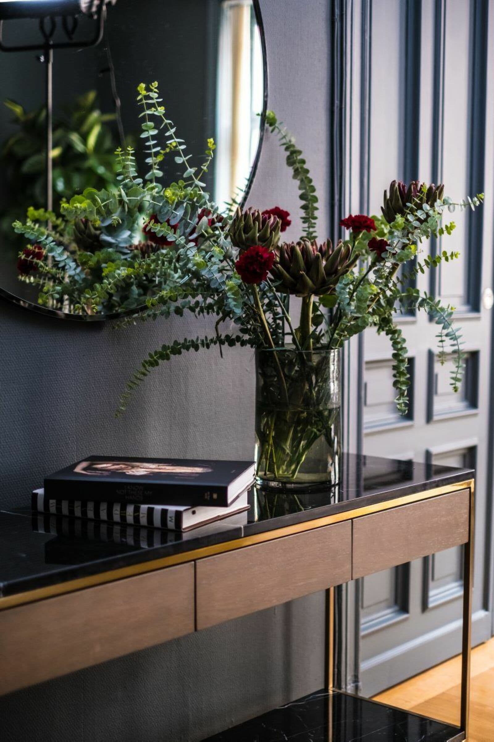 this is a hallway cabinet in art deco style featured on residence magazine