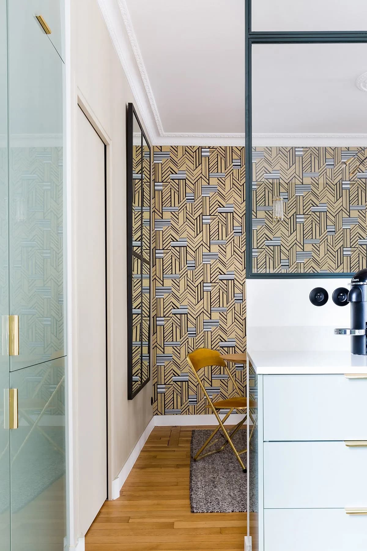 this is a parisian apartment with art deco gold and green wallpaper featured on cote maison