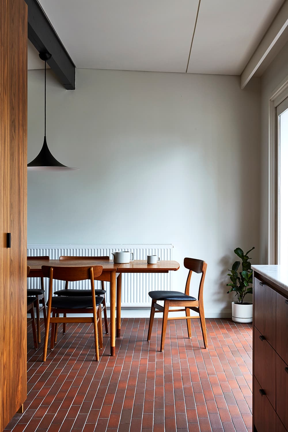 this is an example of using concrete tiles for a kitchen area, featured in The Local Project